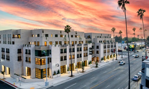 Exterior of Rae on Sunset new apartments West Hollywood with a view of the available retail and restaurant space.