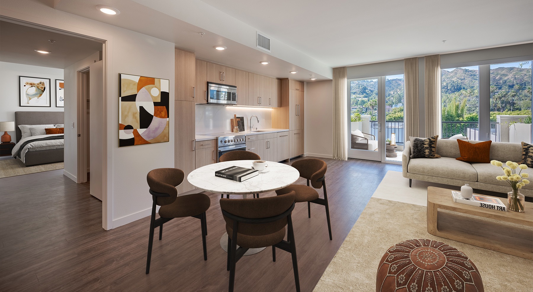 Sunlit living area in furnished West Hollywood apartment at Rae on Sunset.